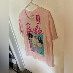 Barbie short sleeve shirt in size Large. Graphics on front & back of shirt. NWT